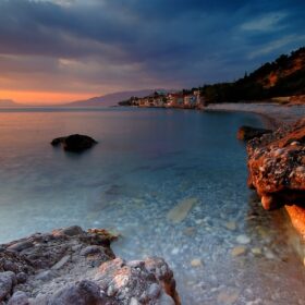 Akrogiali Avias beach in the Peloponnese — turquoise sea, pine-fringed cove