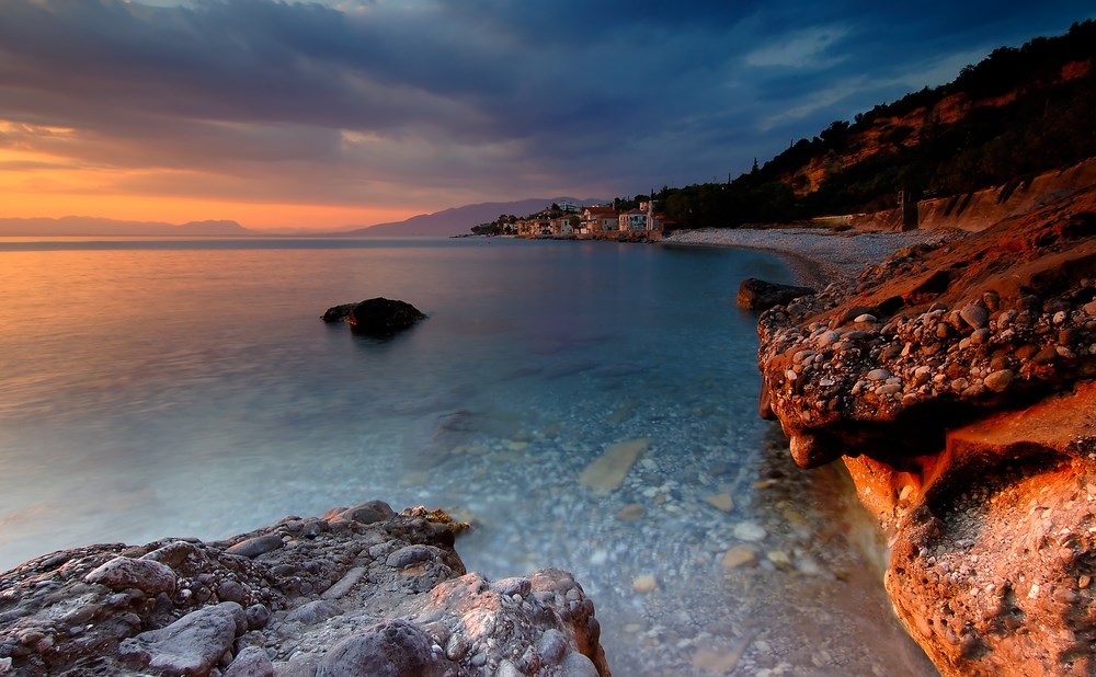 Akrogiali Avias beach in the Peloponnese — turquoise sea, pine-fringed cove